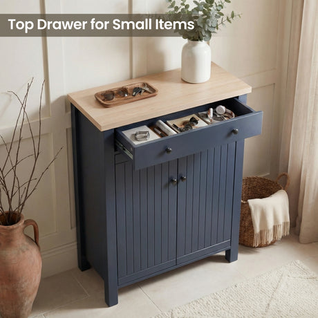 [Blue] Linra shoe cabinet with top drawer pulled open holding sunglasses, watch, and accessories in a panelled hallway