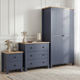 [Blue] Linra bedroom furniture set with 2 door wardrobe, 3 drawer chest and 2 drawer bedside in panelled room