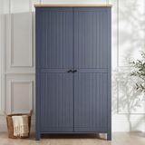 [Blue] Linra bedroom furniture set wardrobe shown closed with two grooved panel doors and black knob handles