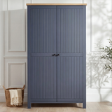 [Blue] Two door Linra bedroom furniture set wardrobe photographed beside basket and olive branch