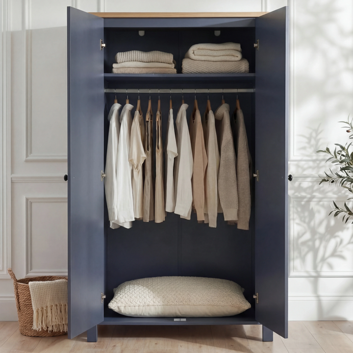 [Blue] Open Linra bedroom furniture set wardrobe revealing hung jumpers and cushion on lower base panel