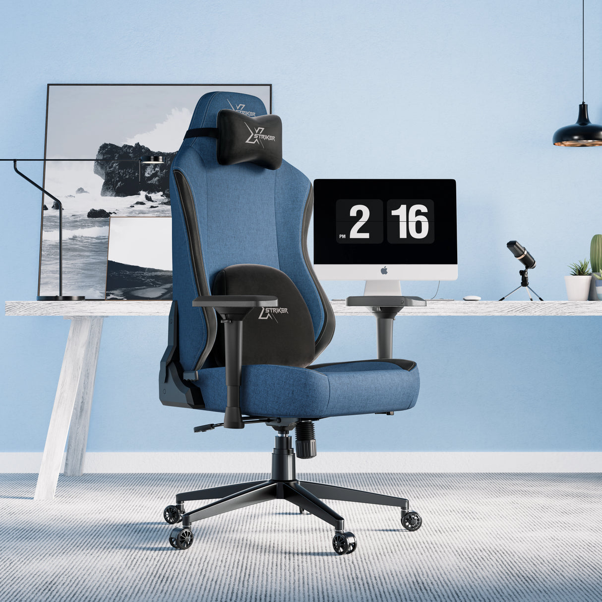 Xstriker Ergonomic Fabric Home Office Chair with 4D Armrest for Adults in blue and gray, placed in a modern home office setup with a desktop computer.