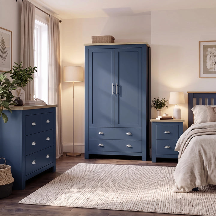 [Blue] Bedroom scene with wardrobe, chest and bedside around a bed, rug, lamps, plants, wall art, and curtains