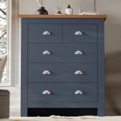 [Blue] 5 drawer chest with 2 small and 3 large drawers in styled bedroom