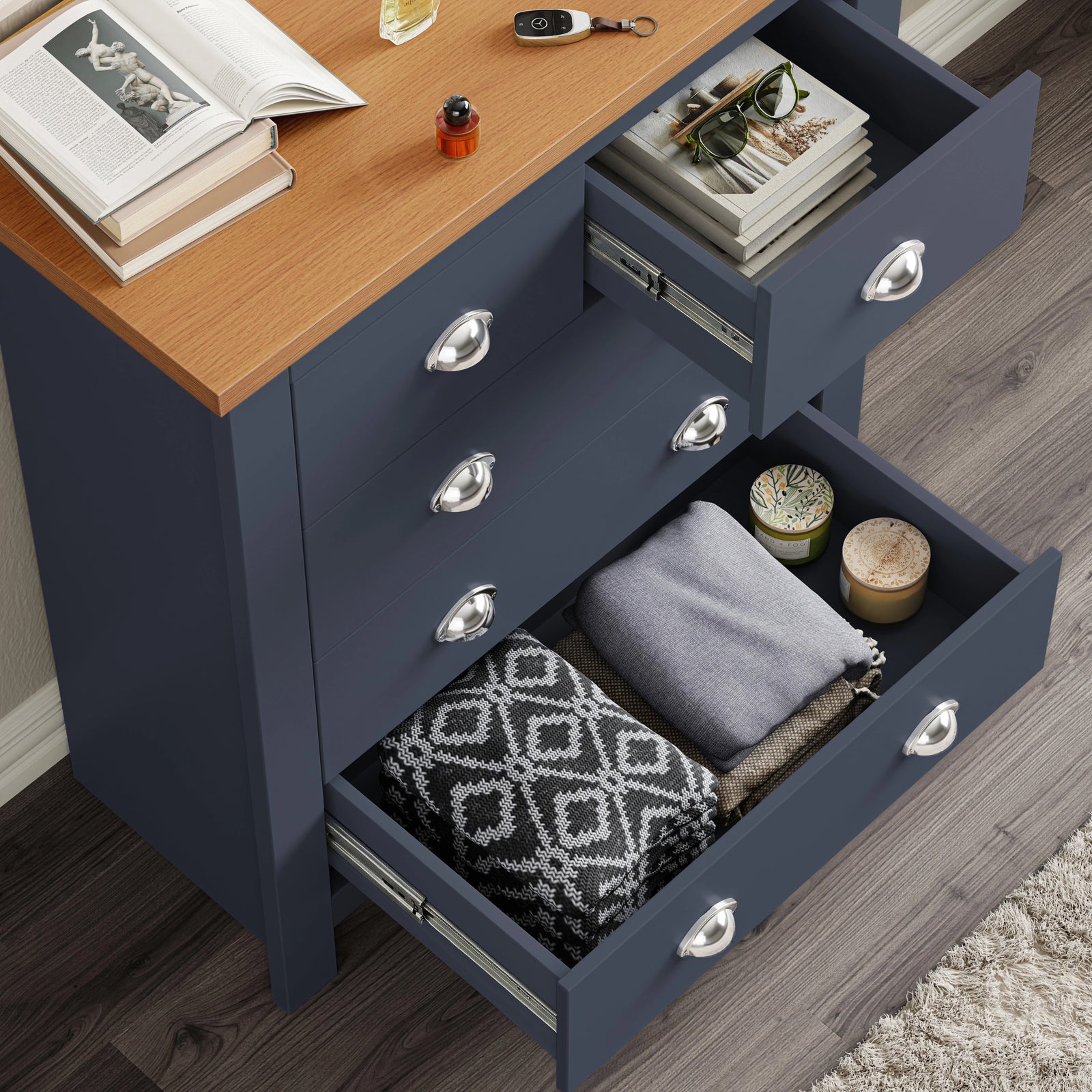 [Blue] 5 drawer chest open showing oak top surface with items and drawer depth