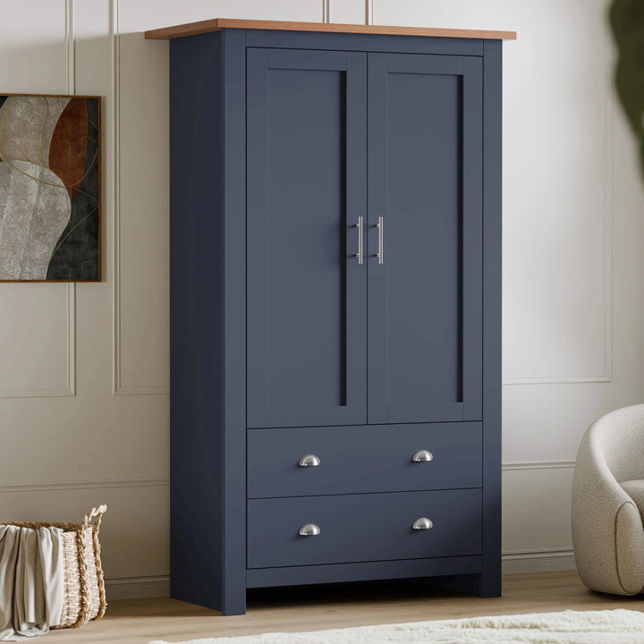 [Blue] Angled blue Shaker double wardrobe with silver handles, oak top edge and basket alongside