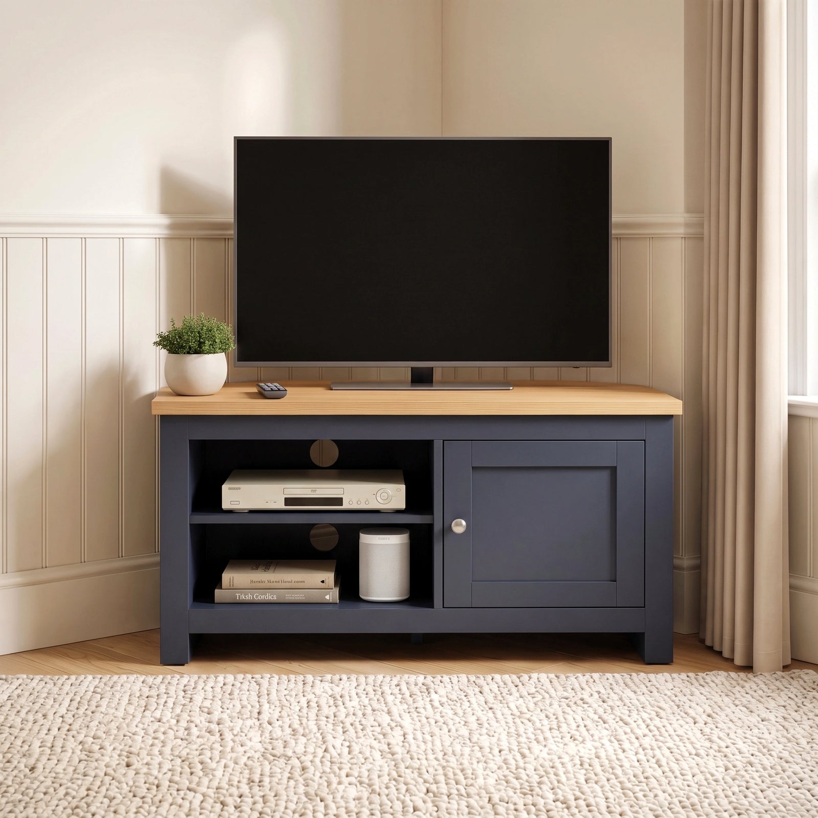 [Blue] Tavero Blue Corner TV Unit with Storage front view in warm beige corner setting with oak top, two open shelves, shaker door and silver knob