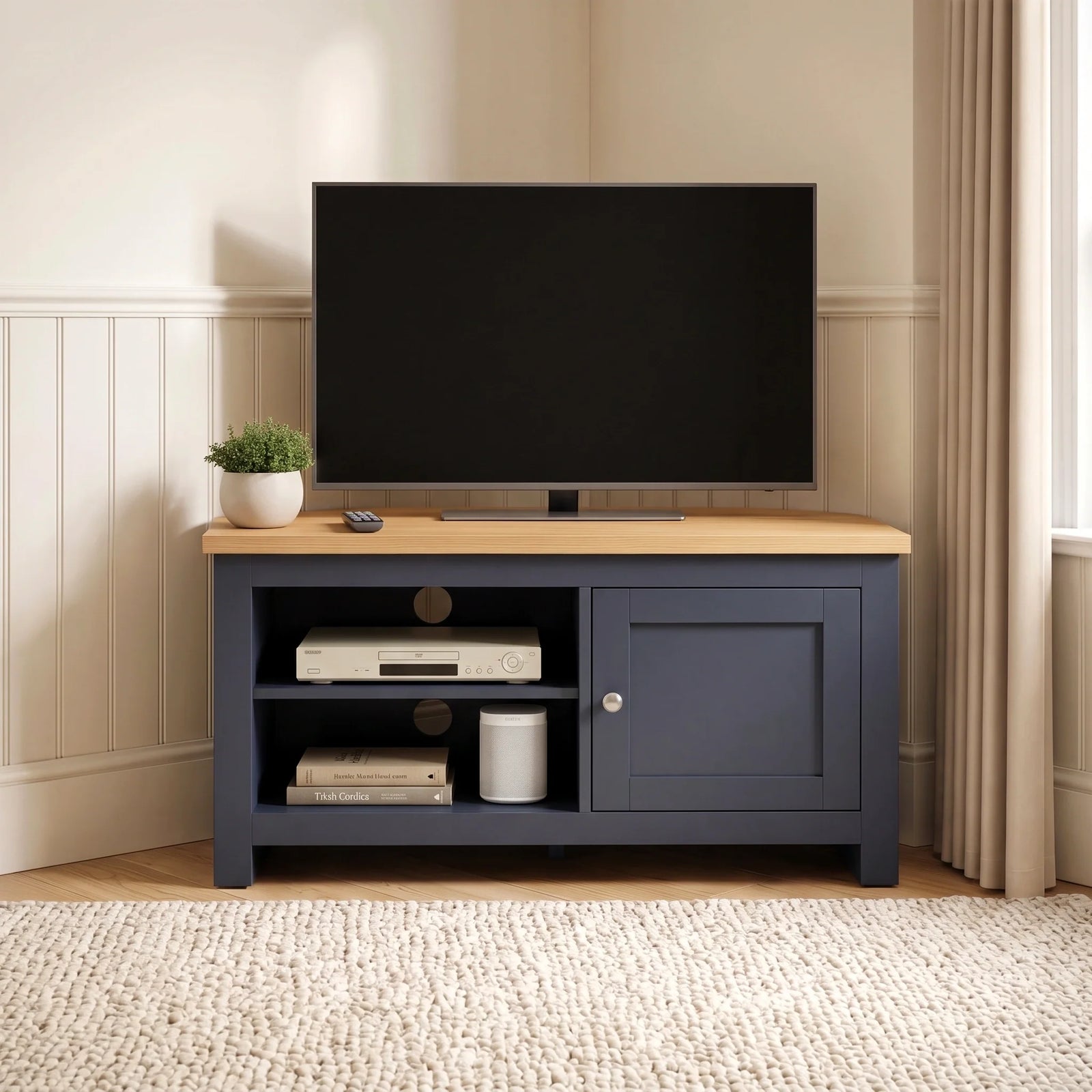[Blue] Tavero Blue Corner TV Unit with Storage front view in warm beige corner setting with oak top, two open shelves, shaker door and silver knob