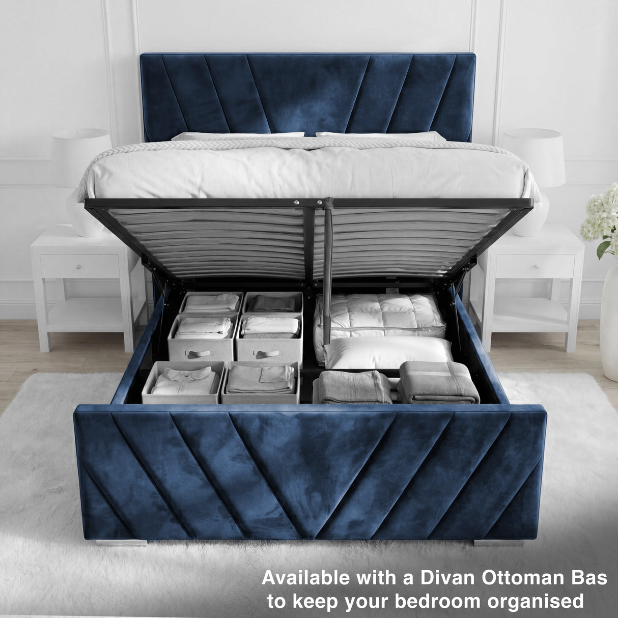 Opened storage compartment beneath the blue velvet ottoman double bed, showcasing spacious hidden storage
