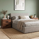 [Dark Bronx] bedroom scene featuring a gray upholstered bed with neutral bedding, flanked by two nightstands.