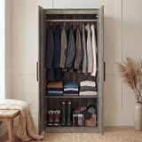 [Ash Grey] Inside the wardrobe of the Blythe bedroom furniture set with jackets on rail and boots on shelf