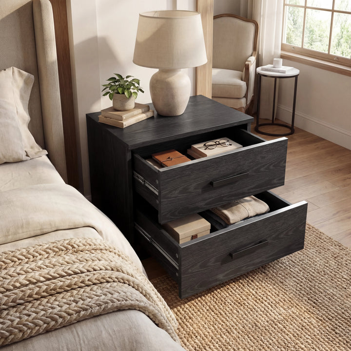 [Black] 2 drawer bedside of the Blythe bedroom furniture set with both drawers open beside a bed in a bedroom