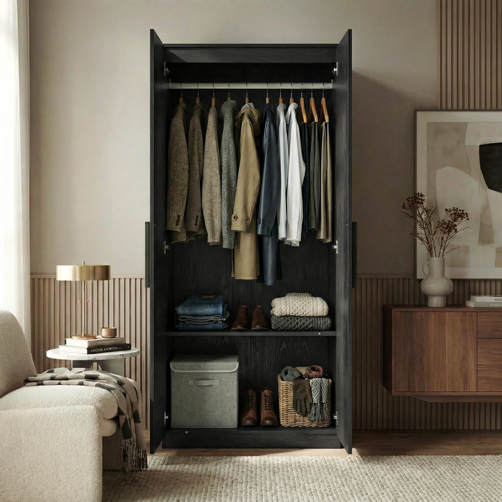 [Black] Wardrobe of the Blythe bedroom furniture set open with top hanging rail of shirts and a lower storage shelf