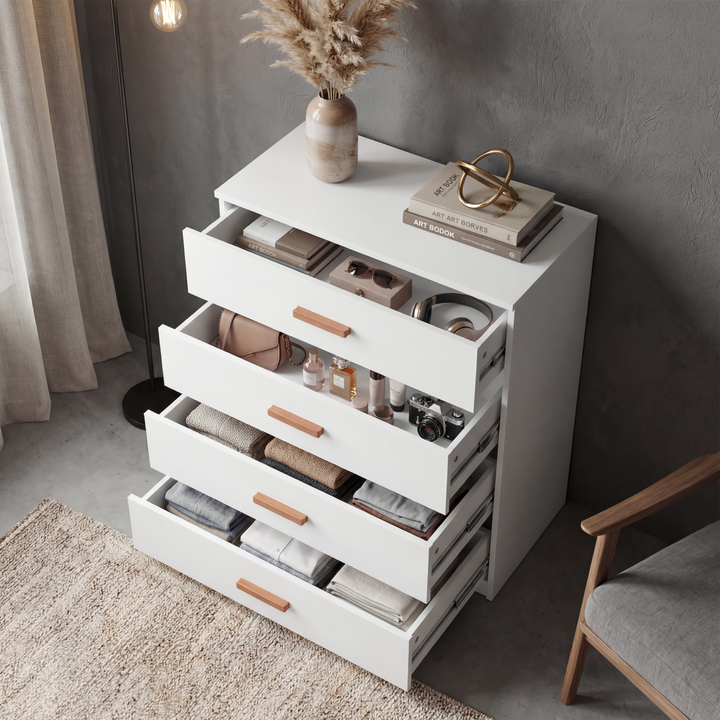 [White] 4 drawer chest of the Blythe bedroom furniture set with all drawers pulled out and items stored in each