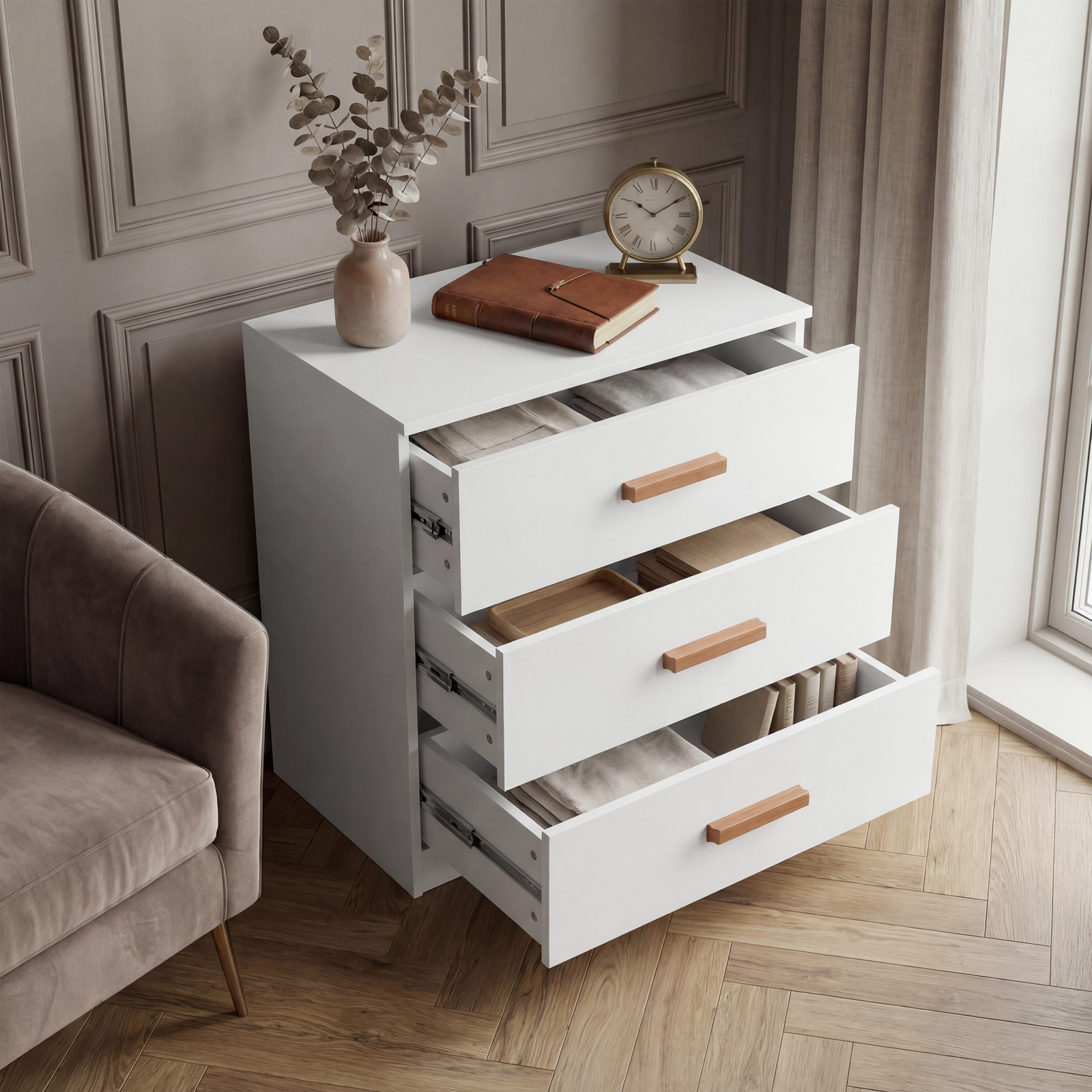[White] 3 drawer chest of the Blythe bedroom furniture set with all drawers pulled out and striped liners inside