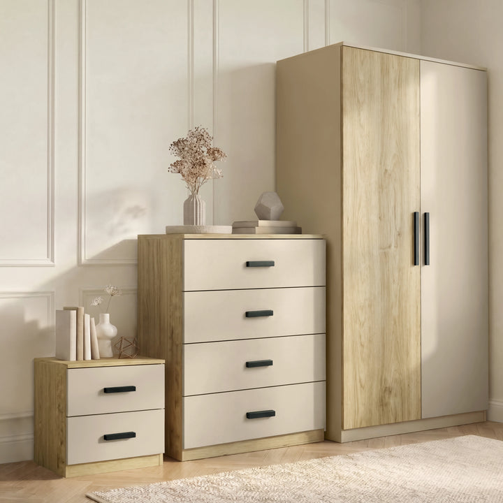 [Oak Cashmere] Blythe bedroom furniture set wardrobe, 4 drawer chest and 2 drawer bedside lined up against panelled wall