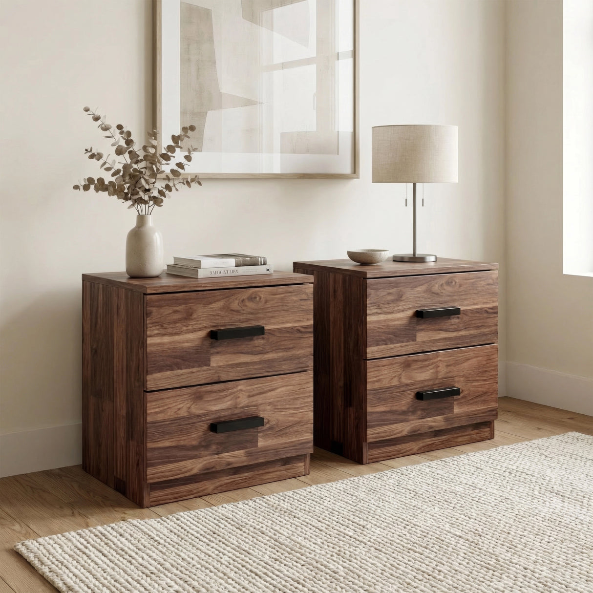 [Dark Bronx] Side angle of bedside pair with vase of dried stems on left and lamp on right unit