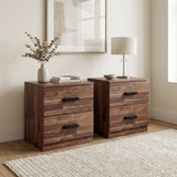 [Dark Bronx] Side angle of bedside pair with vase of dried stems on left and lamp on right unit