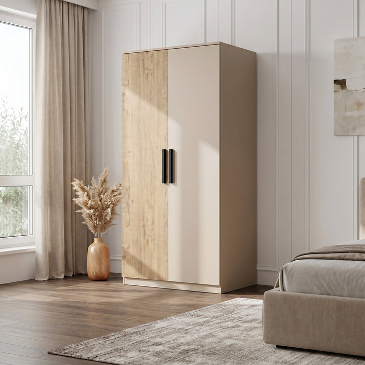 [Oak+Cashmere] Blythe 2 Door Wardrobe with Shelves and Hanging Rail styled beautifully next to a bed setup.