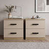 [Oak Cashmere] Pair of two drawer bedside tables side by side on woven rug with copper lamp and eucalyptus left, books right