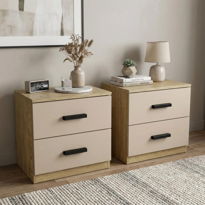 [Oak Cashmere] Side angle view of bedside table pair with digital clock and dried stems on left, lamp on right top