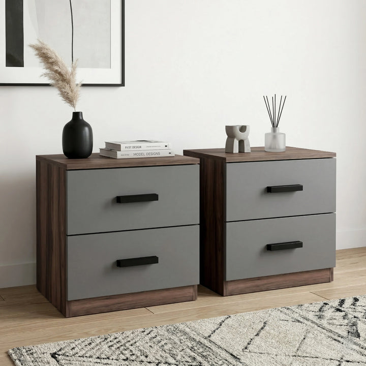 [Walnut Grey] Pair of bedsides on cream rug viewed from angle with black handles on grey drawers and walnut tops