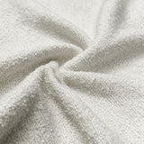 [Cream | Set of 4] Close-up of soft boucle upholstery showing thick textured boucle fabric.