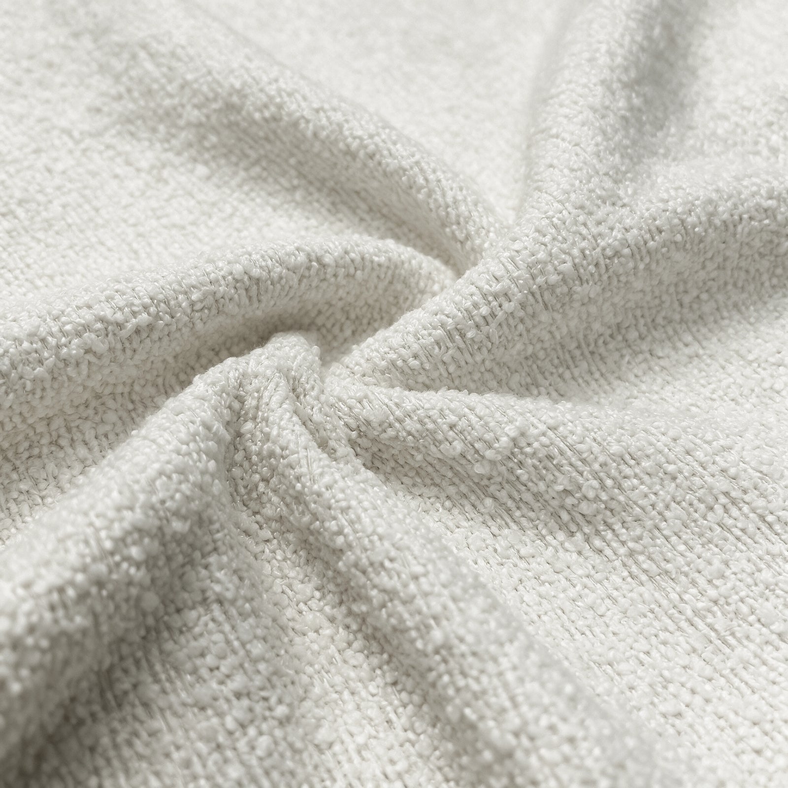 [Cream | Set of 4] Close-up of soft boucle upholstery showing thick textured boucle fabric.
