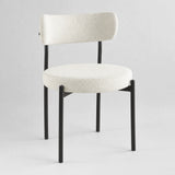 [Cream | Set of 4] Front studio view of boucle dining chair with rounded seat, curved back and black metal legs.