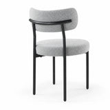 [Light Grey | Set of 4] Back studio view of boucle dining chair showing curved backrest and black support frame.