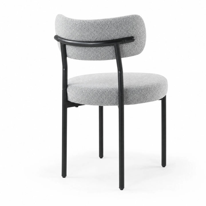 [Light Grey | Set of 4] Back studio view of boucle dining chair showing curved backrest and black support frame.