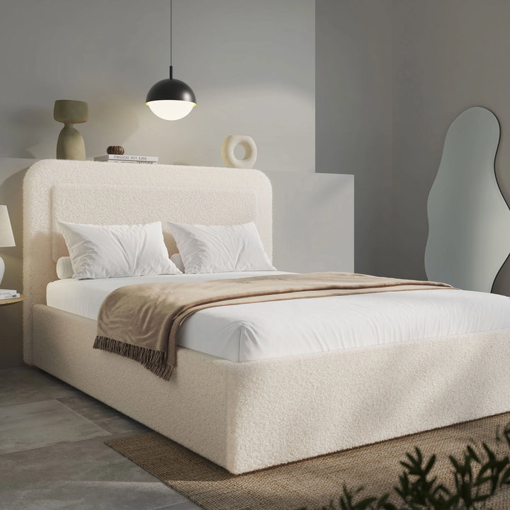 [Double | Beige] Curved headboard boucle ottoman bed in a neutral room with bedding and decorative cushions