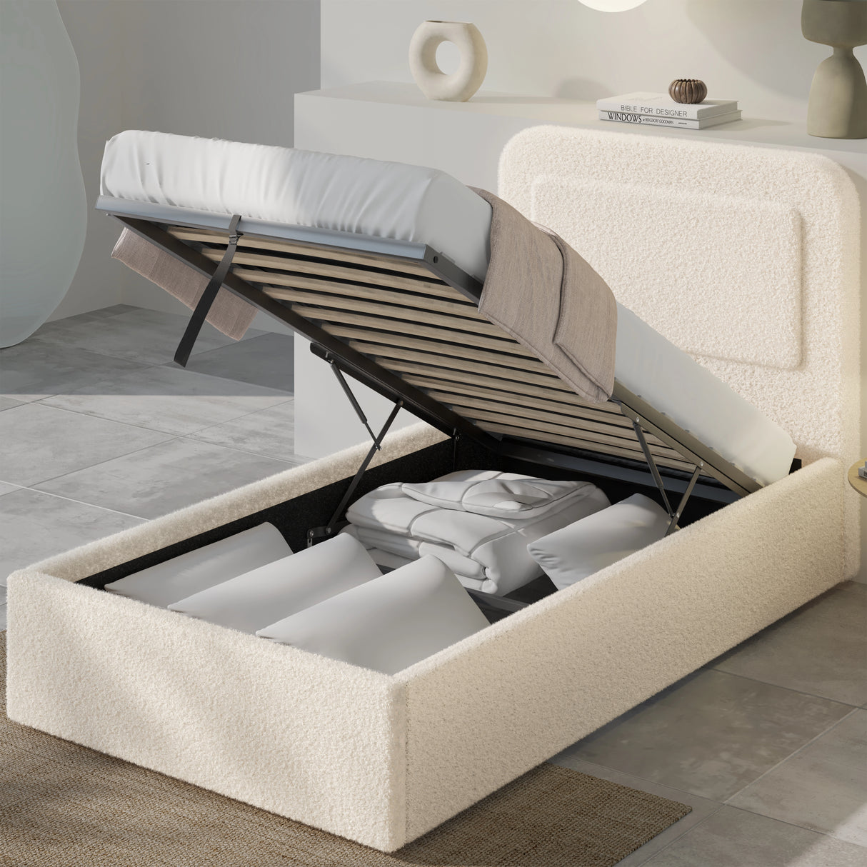 [Single | Beige] Ottoman bed lifted open revealing deep storage filled with cushions boxes and folded linens inside