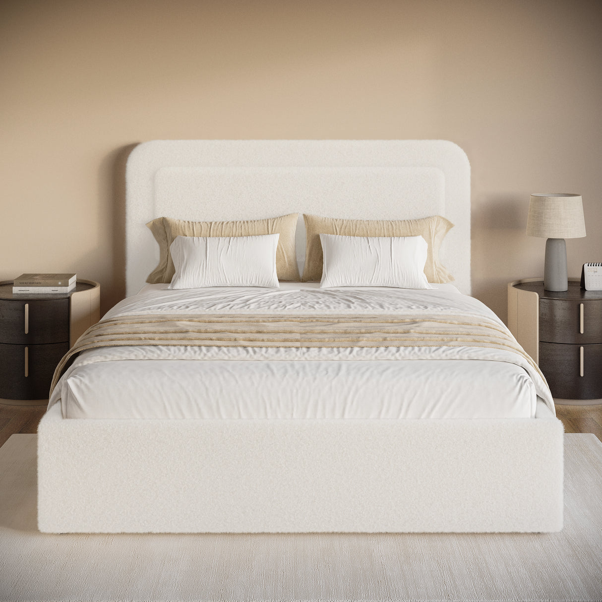 Boucle upholstered ottoman storage bed with curved headboard in white, featuring gas-lift storage and soft fabric finish. Ideal for modern bedrooms.