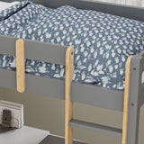 close-up of bunk bed wooden ladder rails and blue bedding featuring white cloud pattern