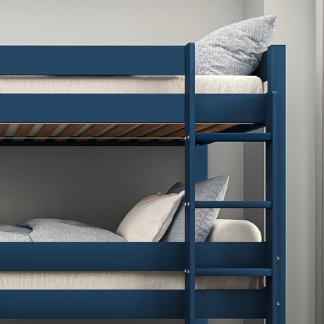 Detail of upper ladder and safety rails on blue triple bunk bed, built for secure climbing and durability.
