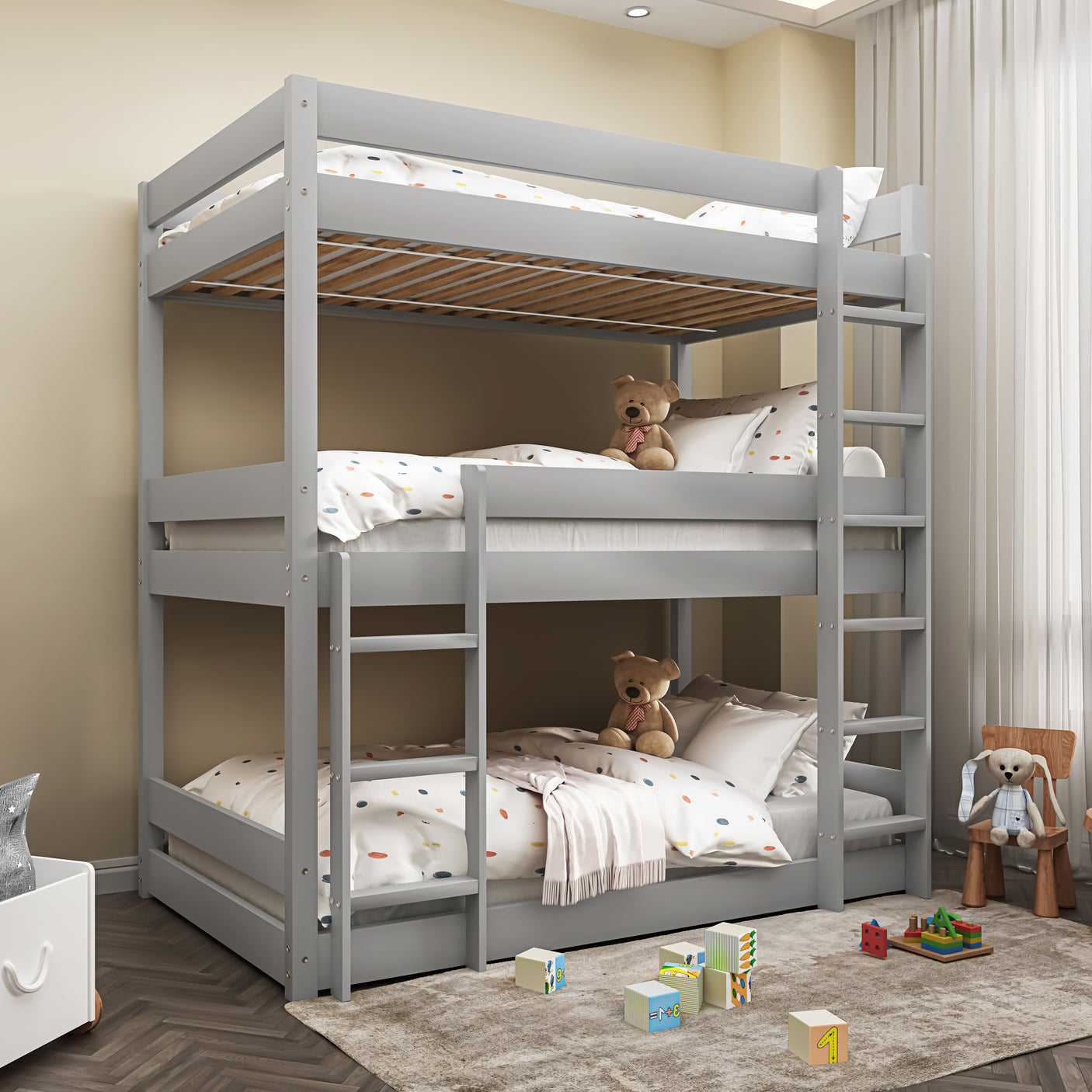 Grey triple bunk bed for kids with playful bedding and toys, ideal for shared bedrooms and space-saving setups.