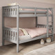 bunk beds grey with quilt, cushions, and stairs, combining comfort and style for kids.
