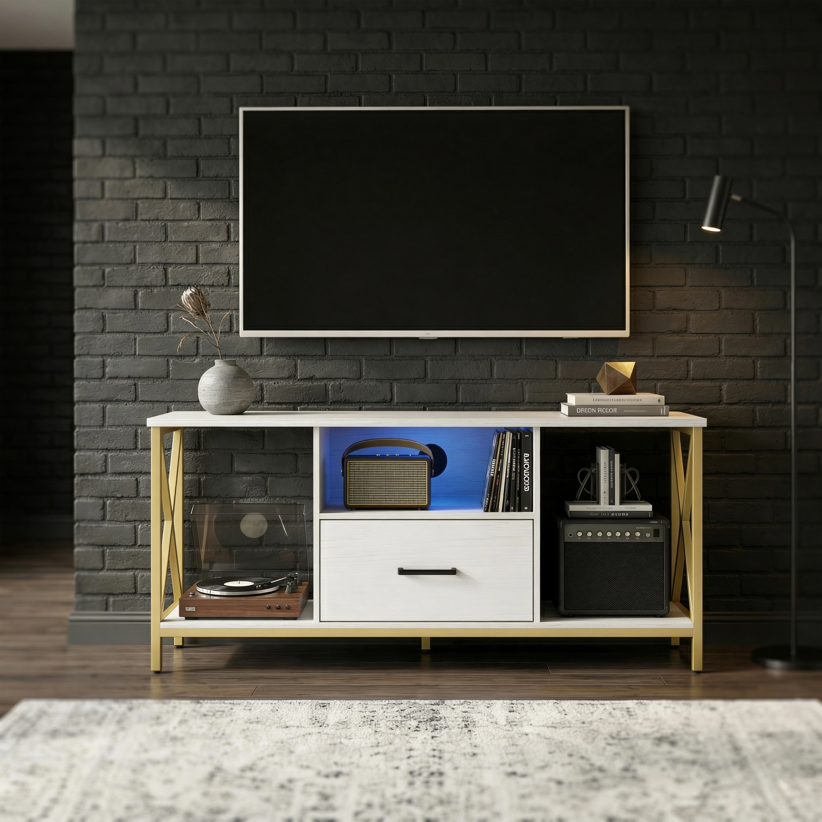 [White] White Calvera TV unit in a moody brick-walled room with patterned rug, blue LED centre shelf and floor lamp