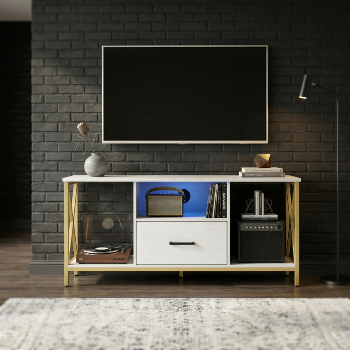 [White] White Calvera TV unit in a moody brick-walled room with patterned rug, blue LED centre shelf and floor lamp