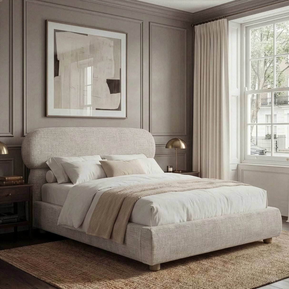 Camel-toned upholstered double bed placed in a bright bedroom, styled with layered bedding and soft neutral decor