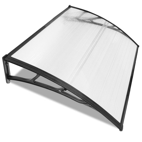 Modern polycarbonate canopy for back doors with sturdy black frame and arched design.