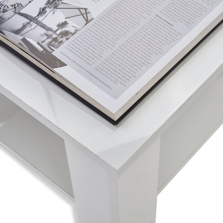 coffee table white with a glossy surface and sleek design, perfect for modern living rooms.