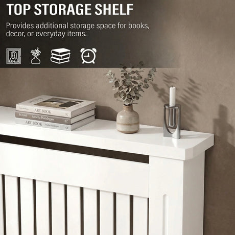 [Small] Chelsea White Radiator Cover top shelf close-up styled with stacked art books, ceramic bud vase, and silver candle holder