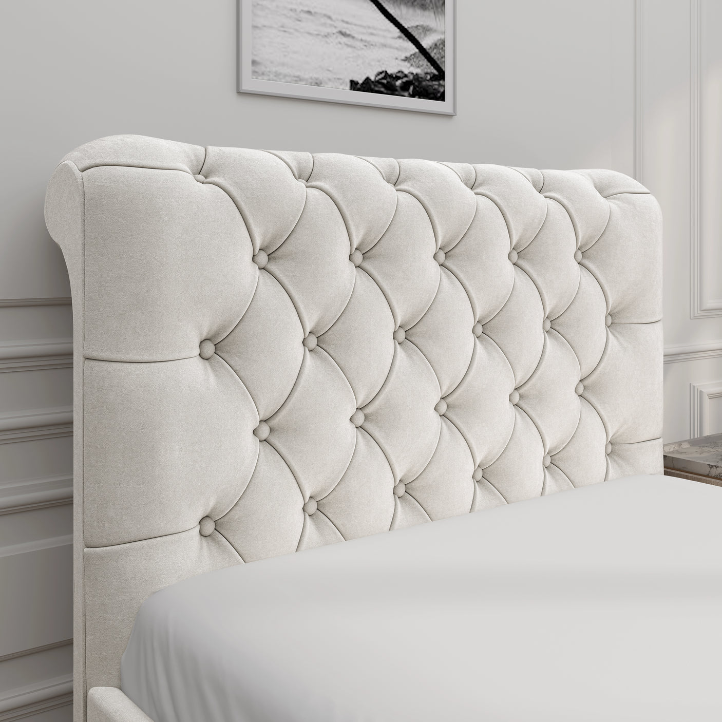Close-up of beige Chesterfield headboard with deep button tufting, part of the side lift ottoman storage bed collection.