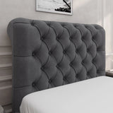Close-up of dark grey Chesterfield headboard with deep button tufting, part of the side lift ottoman bed frame collection.