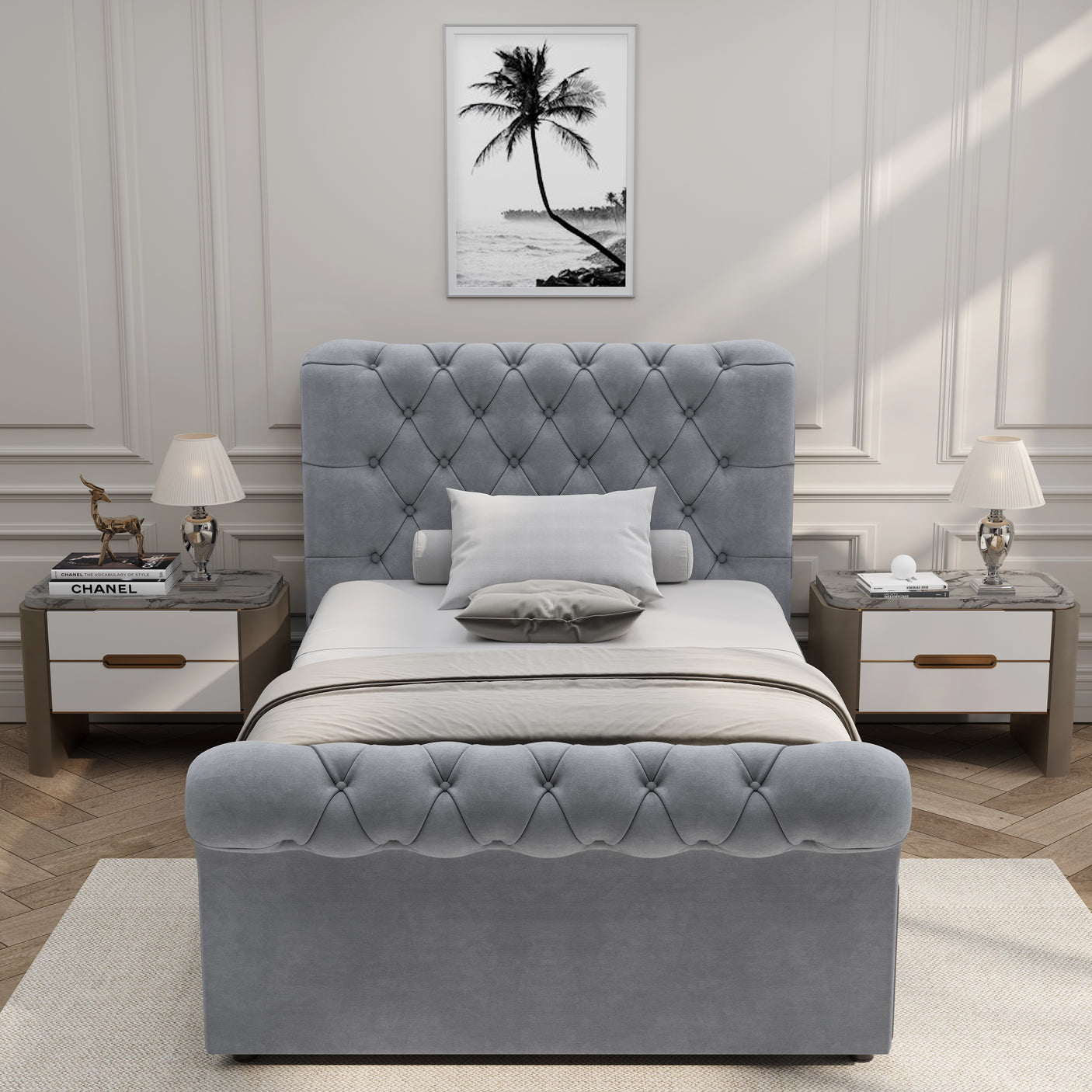 Front-facing view of light grey Chesterfield single ottoman bed, featuring plush tufted design and classic rolled edges.
