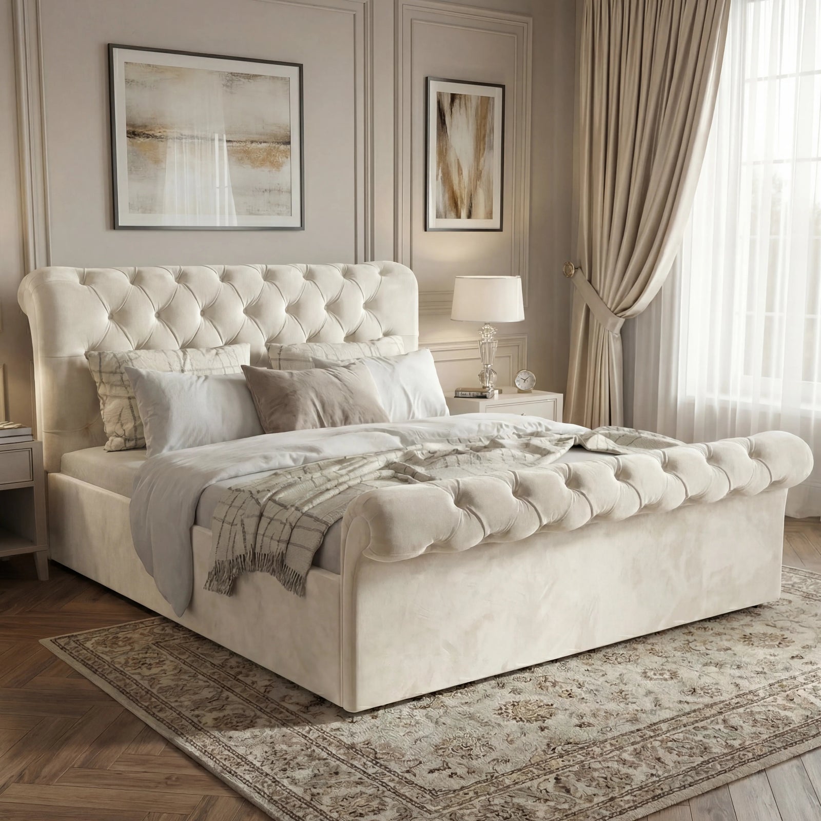 [Beige | King] Chesterfield ottoman bed beige velvet hero in bedroom with herringbone floor and framed art