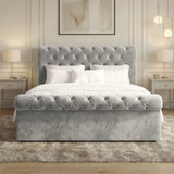 [Double | Grey] Styled front grey double Chesterfield ottoman bed with white bedding between pendant lamps