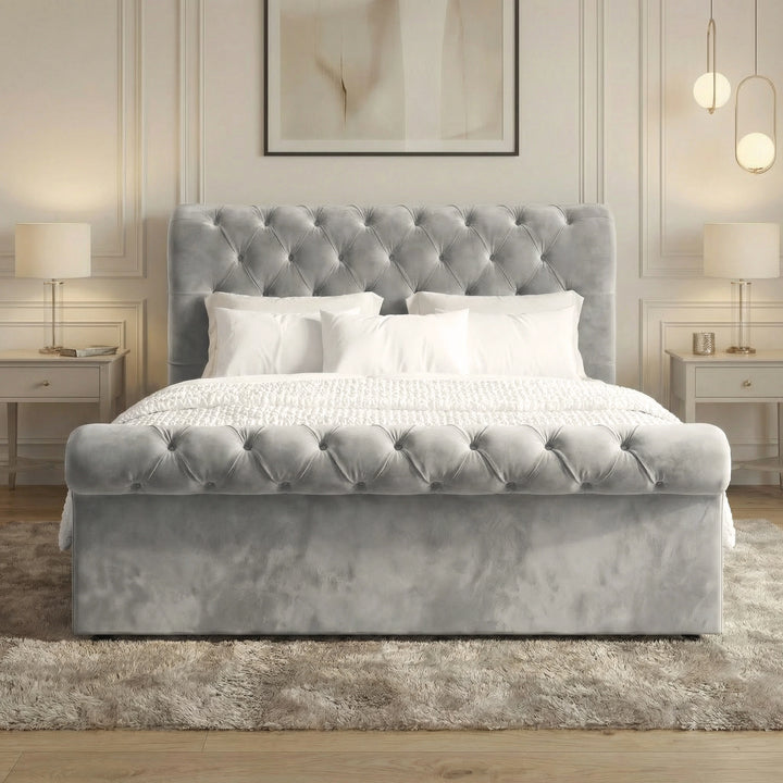 [Double | Grey] Styled front grey double Chesterfield ottoman bed with white bedding between pendant lamps